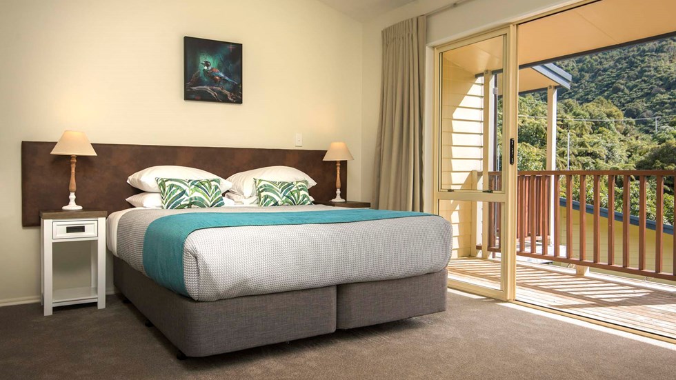 Fern Studio accommodation rooms have a spacious bedroom area and private balcony to enjoy scenic views at Punga Cove in the Marlborough Sounds in New Zealand's top of the South Island