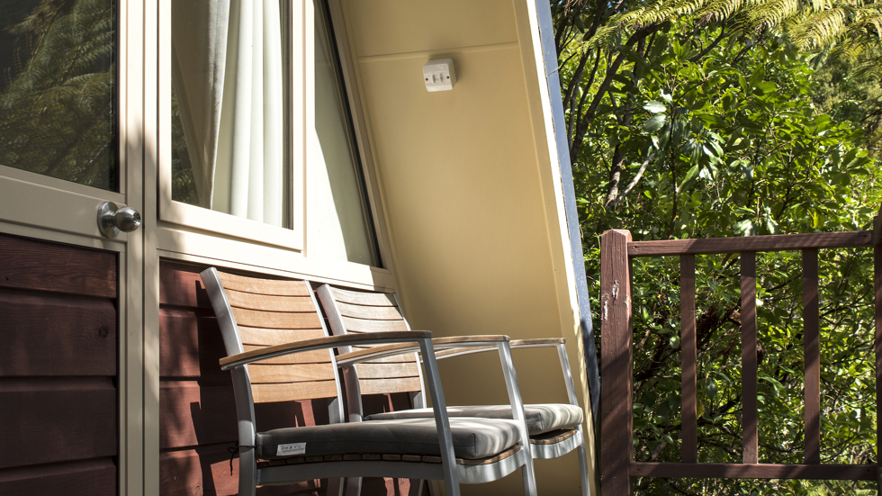 Enjoy a scenic Endeavour Inlet bay view from a private Koru Chalet balcony at Punga Cove in the Marlborough Sounds in New Zealand's top of the South Island.