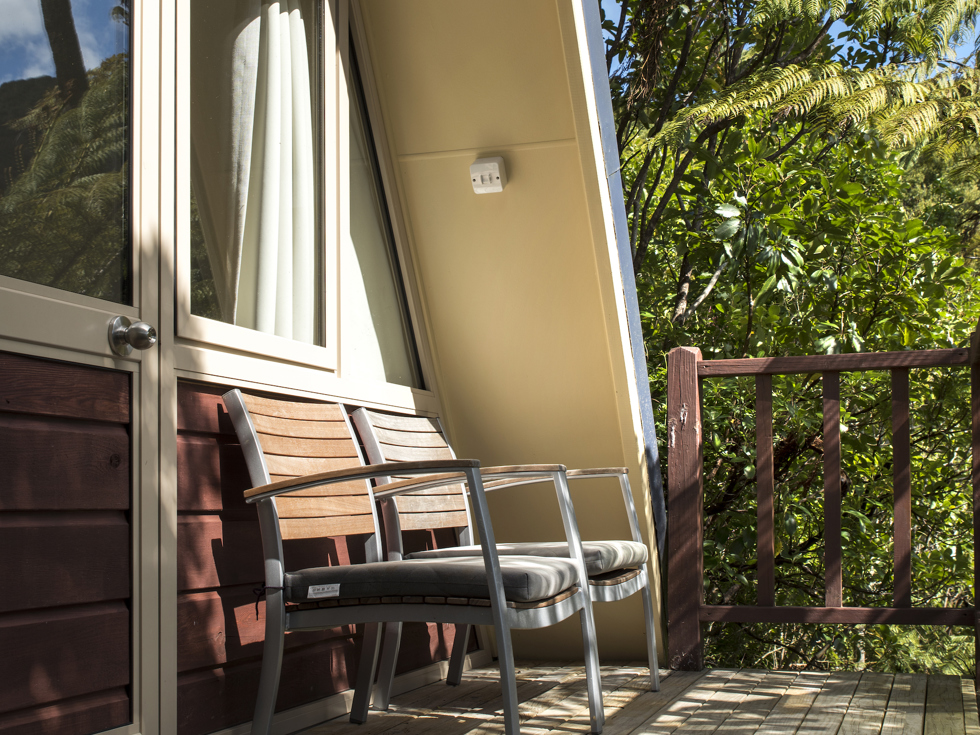 Enjoy a scenic Endeavour Inlet bay view from a private Koru Chalet balcony at Punga Cove in the Marlborough Sounds in New Zealand's top of the South Island.