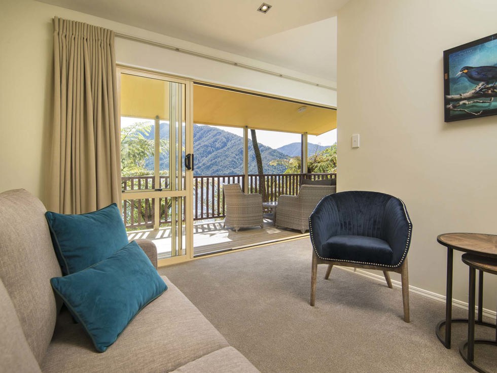 Mamaku Apartment accommodation rooms have a spacious lounge area with sofas and seating and private balcony at Punga Cove in the Marlborough Sounds in New Zealand's top of the South Island