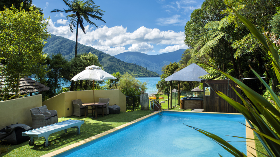 Swim at Punga Cove's accommodation pool which is one of the activities guests can do during their stay in the Marlborough Sounds in New Zealand's top of the South Island