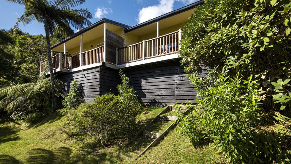 Frond Suite accommodation rooms are surrounded by lush green native bush and have a private balcony at Punga Cove in the Marlborough Sounds in New Zealand's top of the South Island